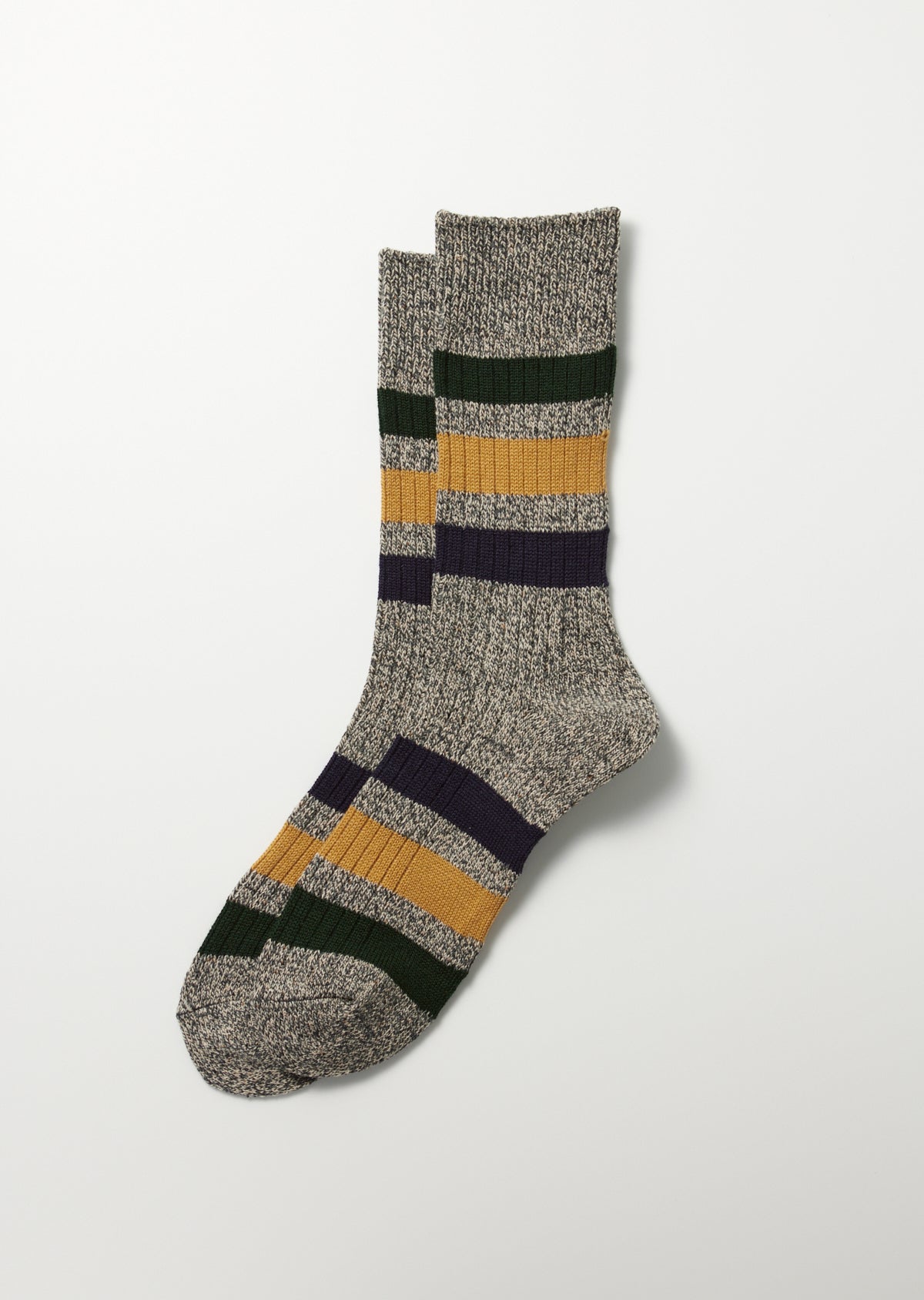Pair of marled grey crew socks with green, yellow, and navy stripes.