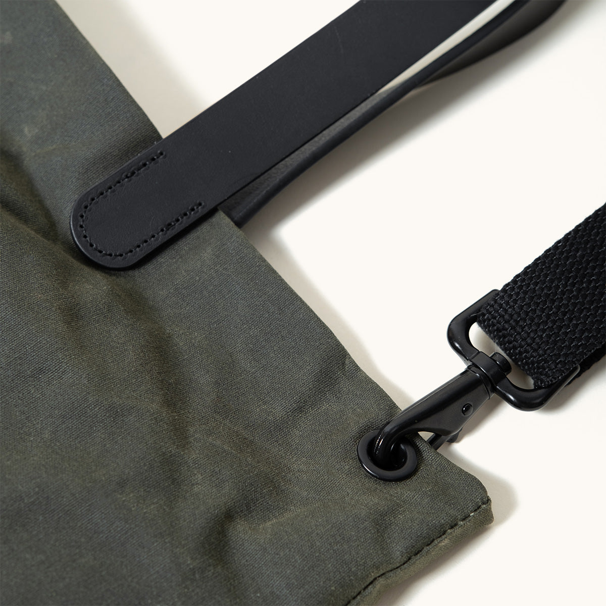 Juniper Green Waxed Canvas Simple Tote with black leather strap and metal hardware detail.