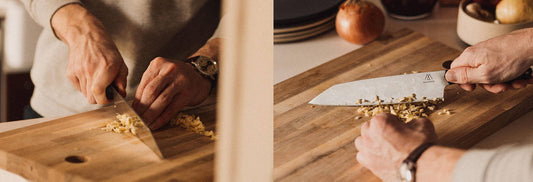 Hands skillfully mincing garlic on a wooden cutting board with a sharp chef’s knife, showcasing proper knife care and technique.