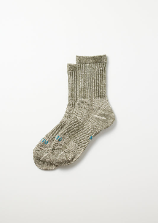 Two heathered olive green double face mini crew socks with ribbed cuffs and blue embroidered detail, lying flat.