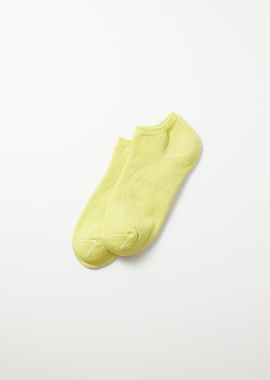 Lime washi pile short socks, a pair laid flat on a white background with subtle shimmer.