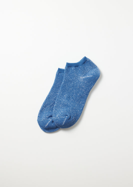 Blue Washi Pile Short Socks with small white flecks, laid flat on a white surface.