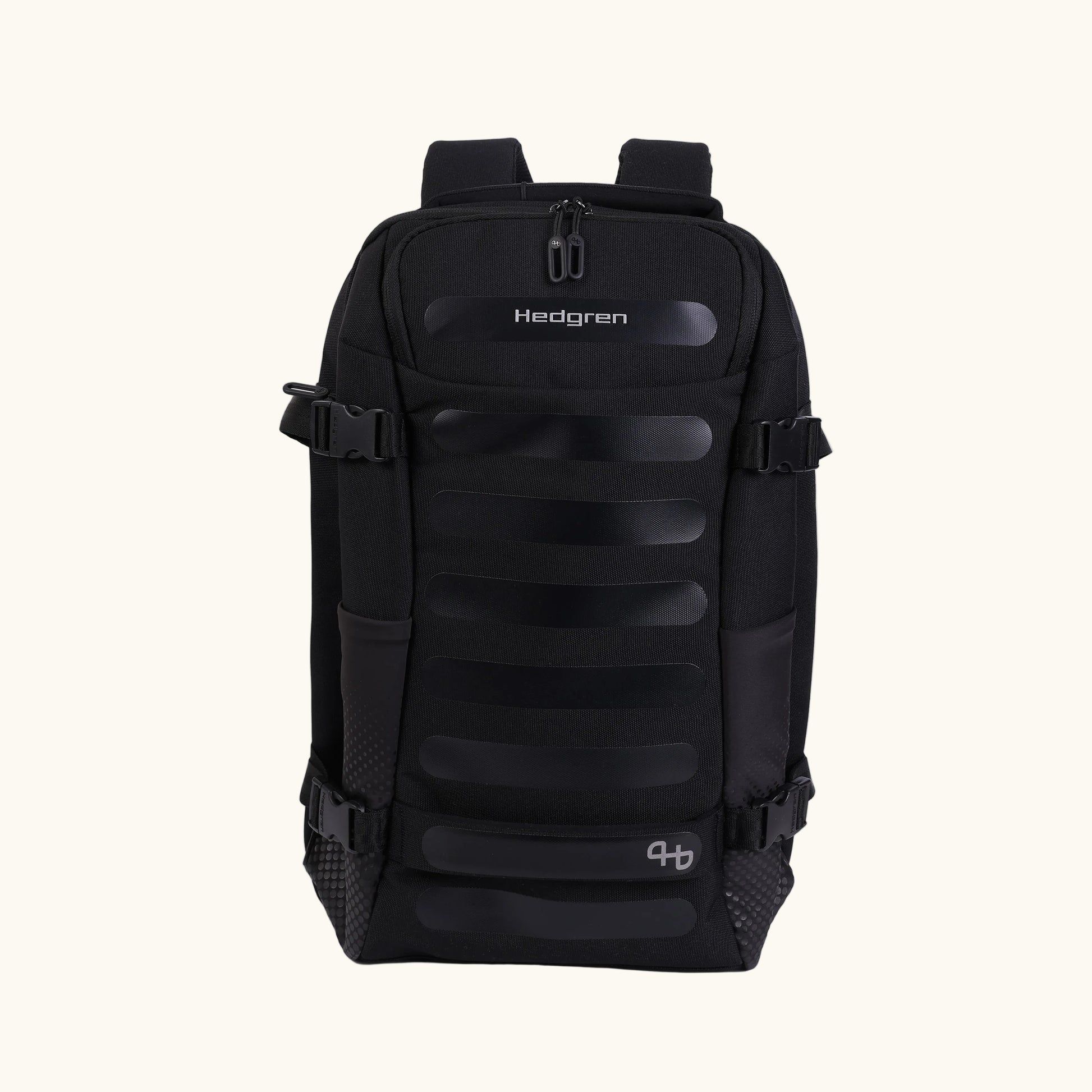 Black Hedgren Trip M backpack with multiple compartments and ergonomic back panel, featuring aRain cover with reflective print and a smart sleeve to attach to luggage handle.