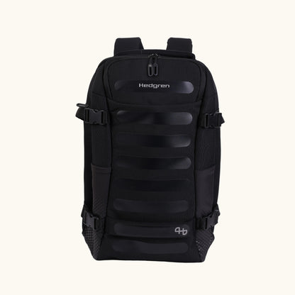 Black Hedgren Trip M backpack with multiple compartments and ergonomic back panel, featuring aRain cover with reflective print and a smart sleeve to attach to luggage handle.