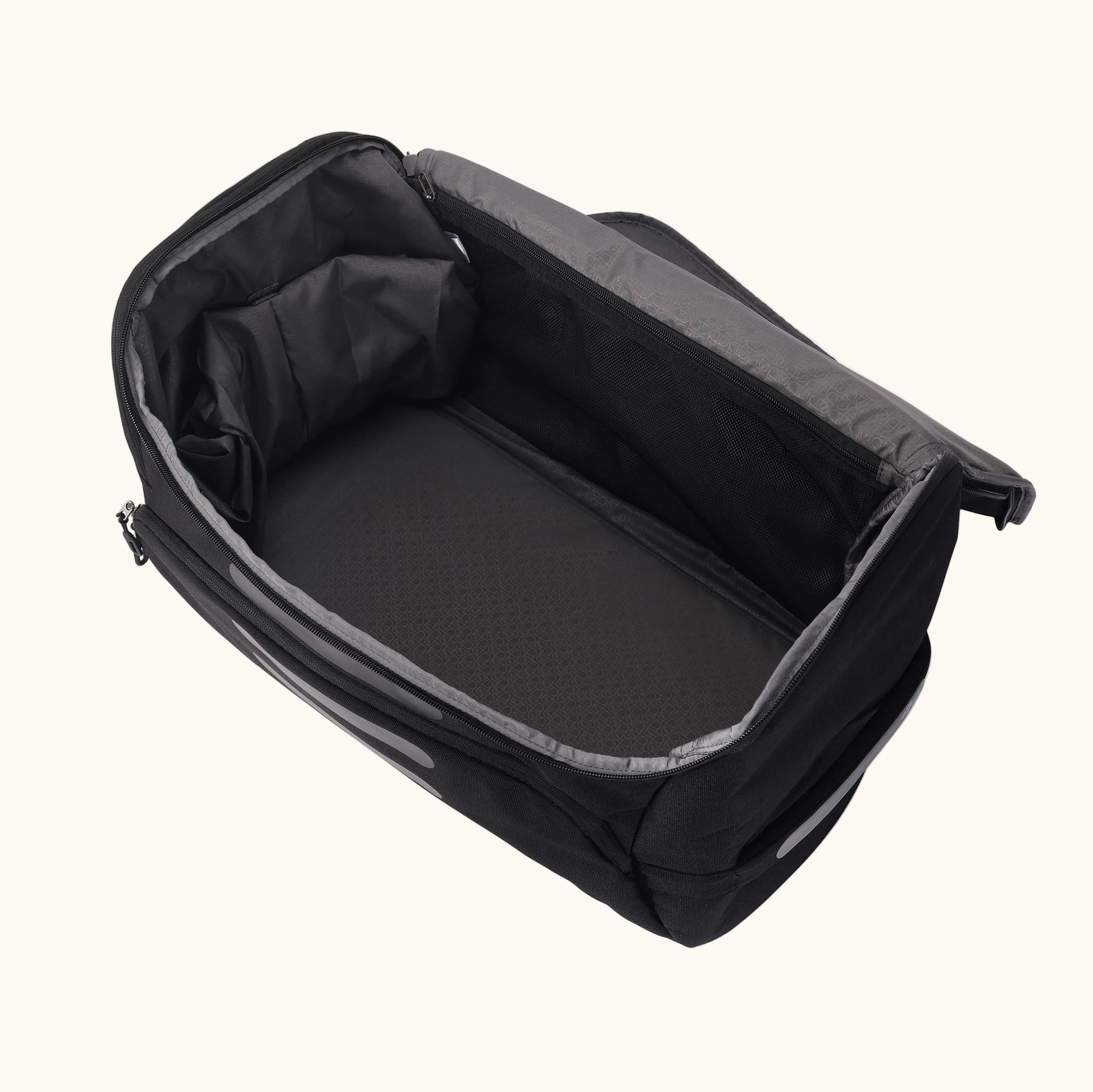 Black carrying case with open lid on white background