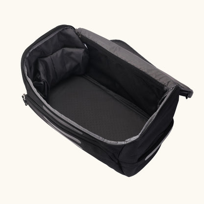 Black carrying case with open lid on white background