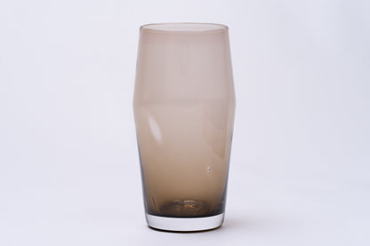 Smoky brown 20oz glass pint by BG Original, with a subtle bubble imperfection.