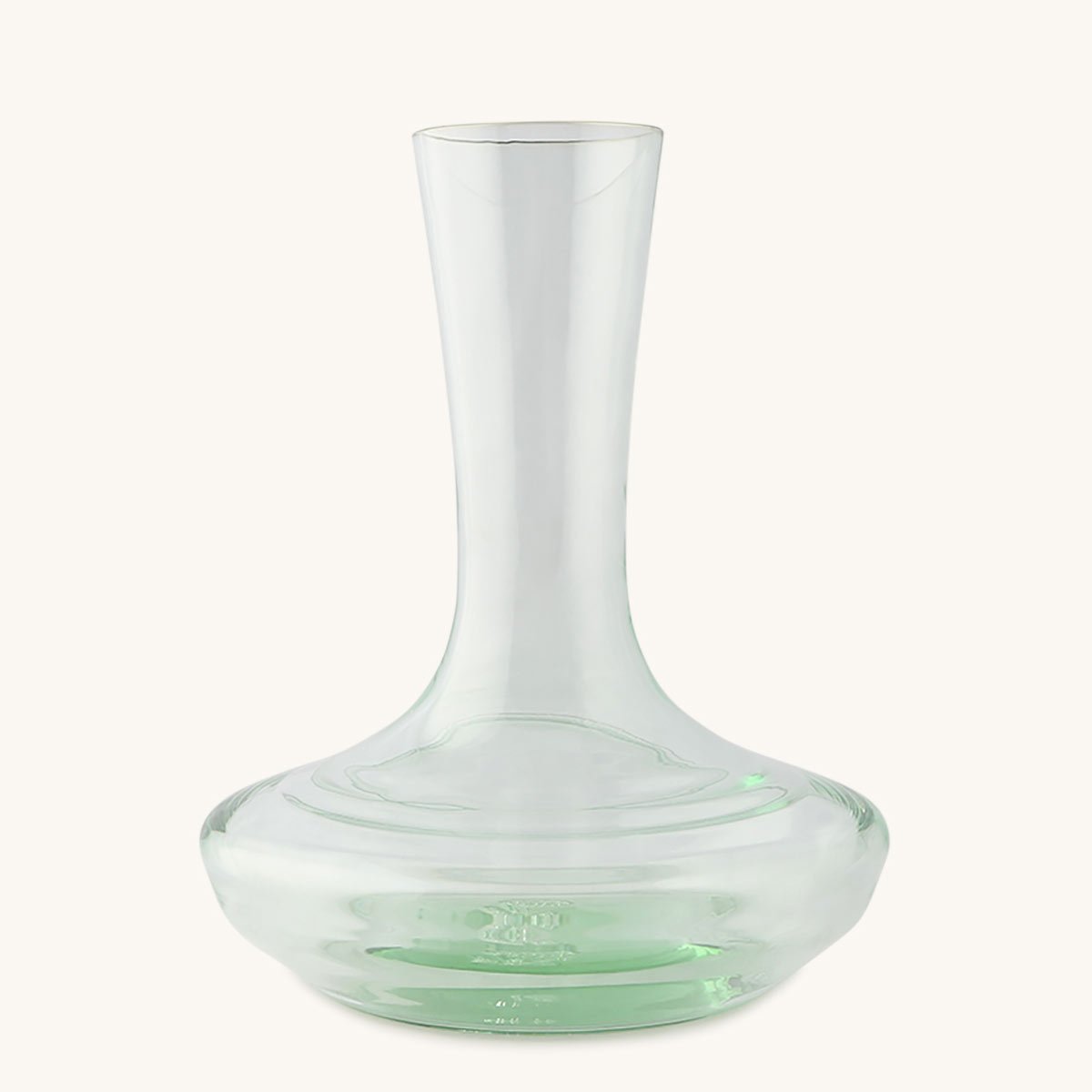 Clear glass decanter with a tall, narrow neck and a wide, rounded base, featuring subtle green tint and textured ripples.