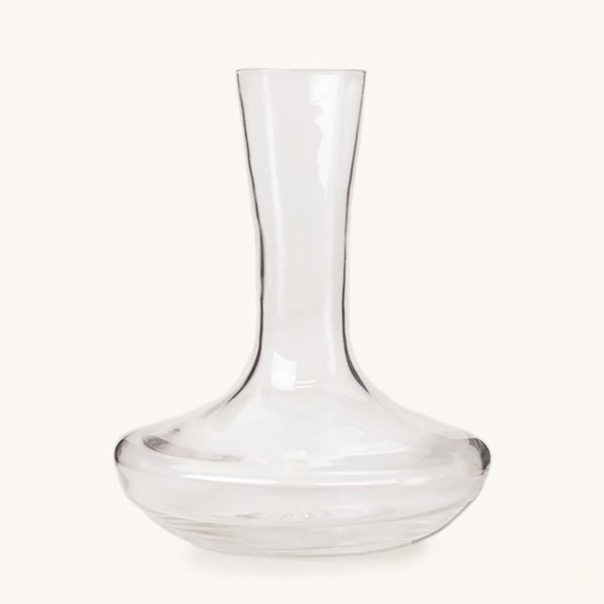 Clear glass decanter with a wide, rounded base and a tall, slender neck.