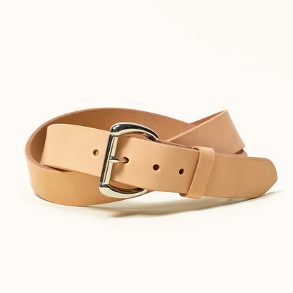 A coiled natural leather belt with a stainless roller bar belt buckle.