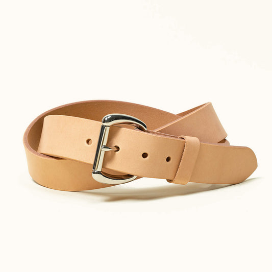 A coiled natural leather belt with a stainless roller bar belt buckle.