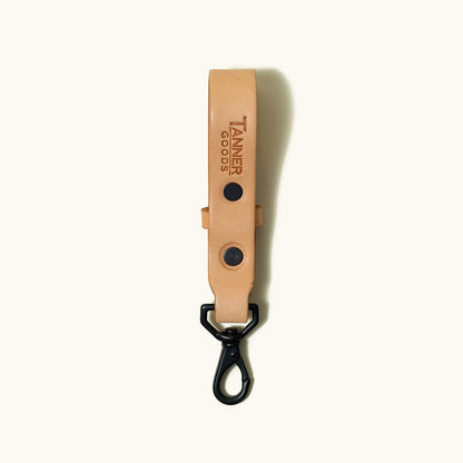 Natural leather Key Lanyard by Tanner Goods with black snaps and a matching swivel hook.
