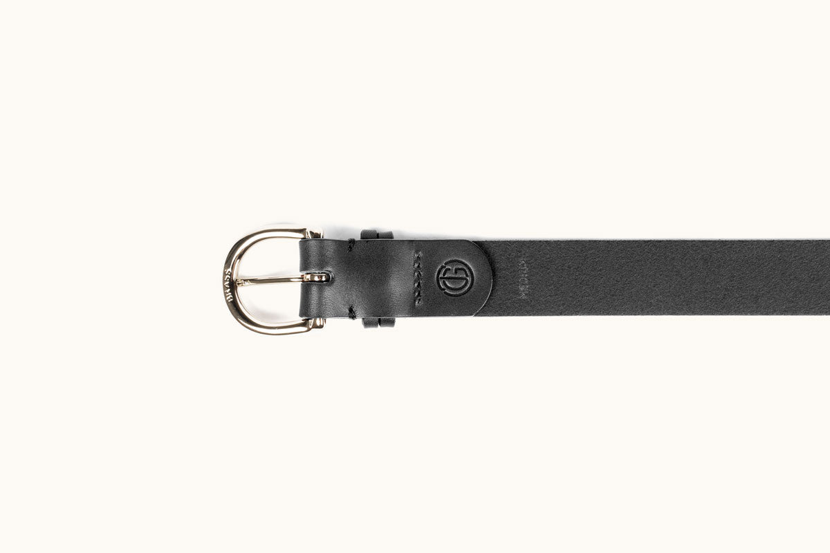 Black leather belt with a gold-toned buckle engraved 'BRASS', featuring an embossed logo and 'MEDIUM' text.