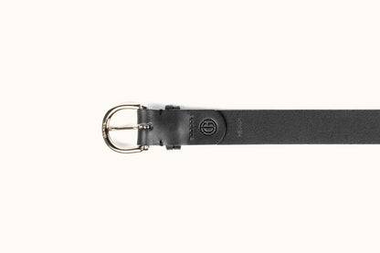Black leather belt with a gold-toned buckle engraved 'BRASS', featuring an embossed logo and 'MEDIUM' text.