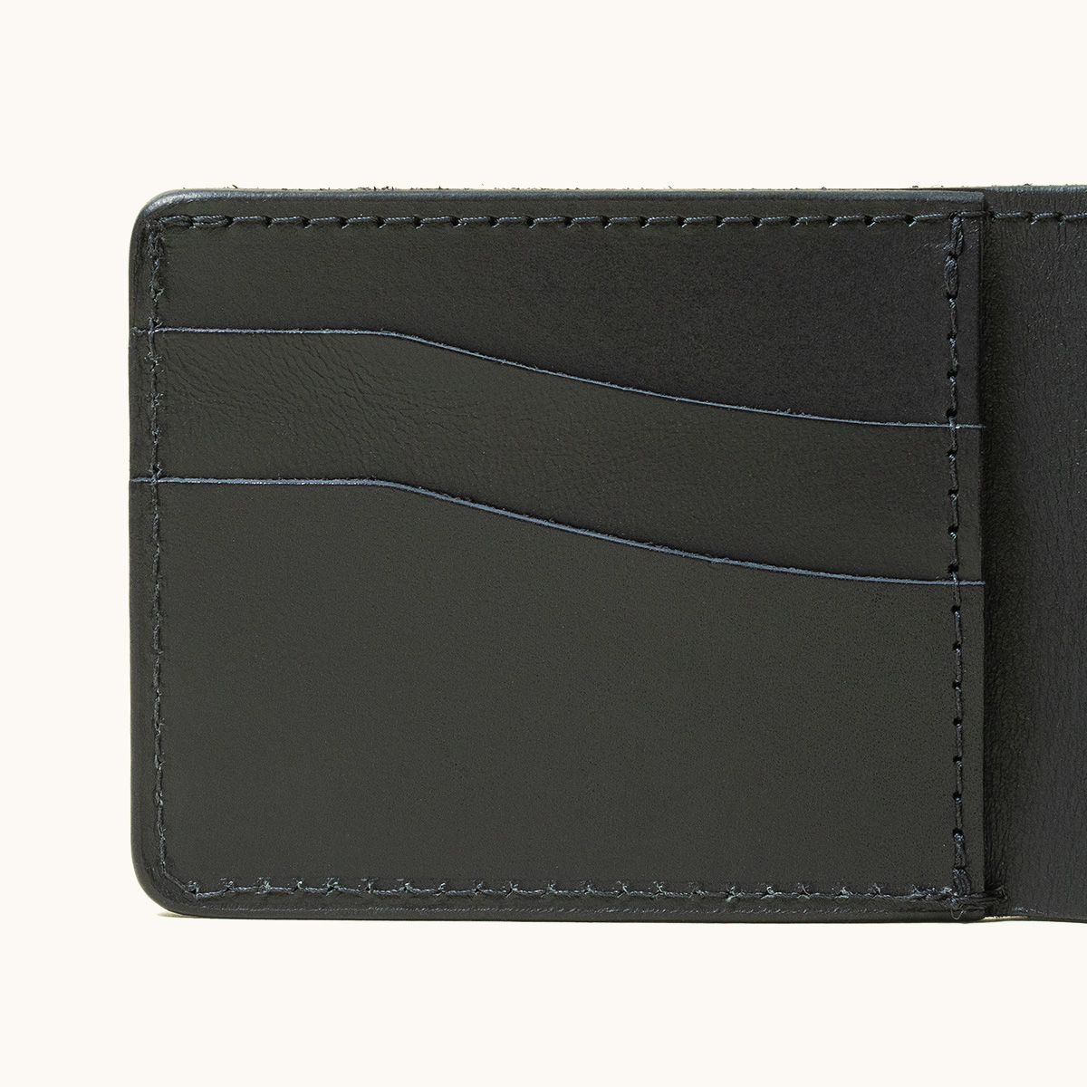 A close up shot of the card holders on the left of the wallet.