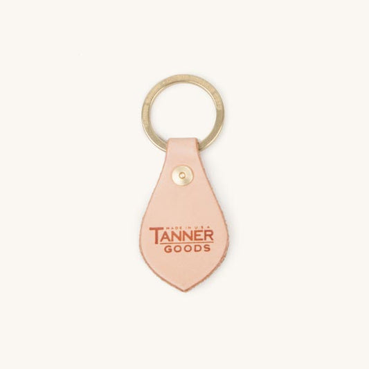 Natural leather key fob by Tanner Goods, featuring a brass keyring and 'Made in USA TANNER GOODS' logo.