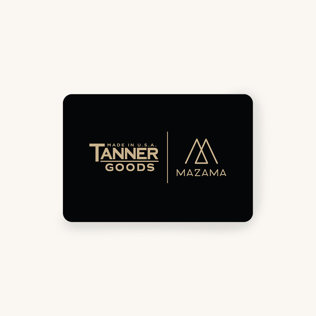 Black gift card featuring 'Tanner Goods' and 'Mazama' gold logos and text, centered with a subtle shadow.